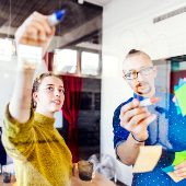 creative-business-people-writing-on-glass-wall-in-3X78A4F.jpg creative-business-people-writing-on-glass-wall-in-3X78A4F.jpg